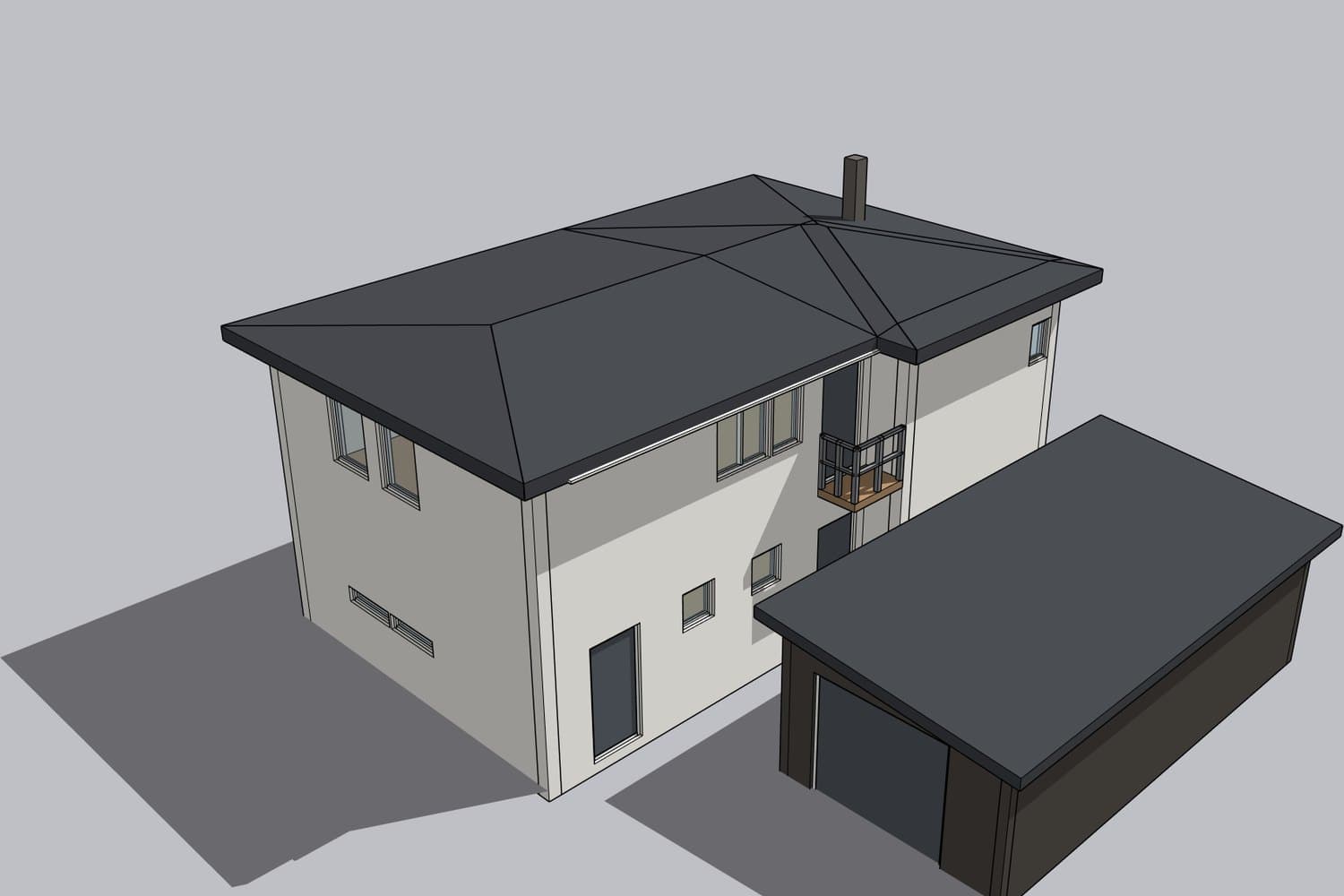 The same house from the entrance side, with a balcony and a detached garage